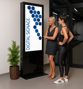 Digital Signage im Fitnessstudio mit Kursplan, Trainingshinweisen und Mitgliedschaftsaktion am Empfang